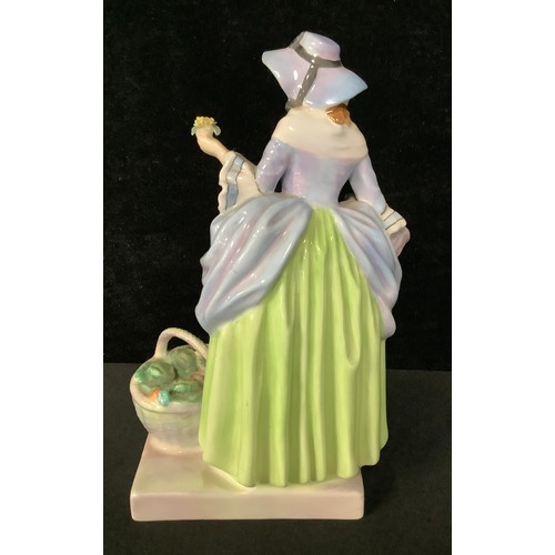 5569 - A Royal Doulton figure, Spring Flowers, HN1807, 18cm high