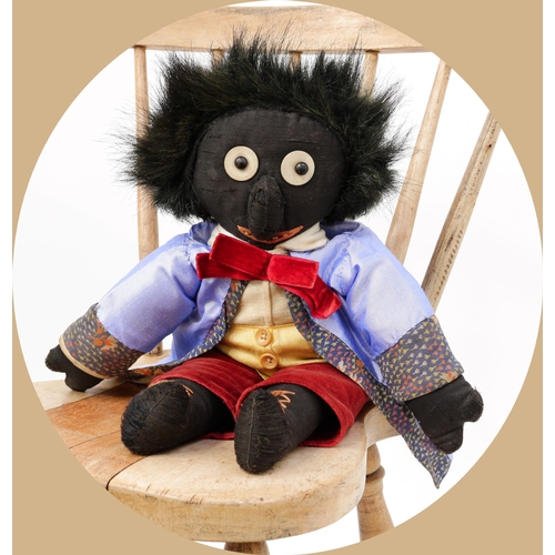 7176 - Toys From The Attic Part II - an early 20th century stuffed cloth black doll, the head applied with ... 