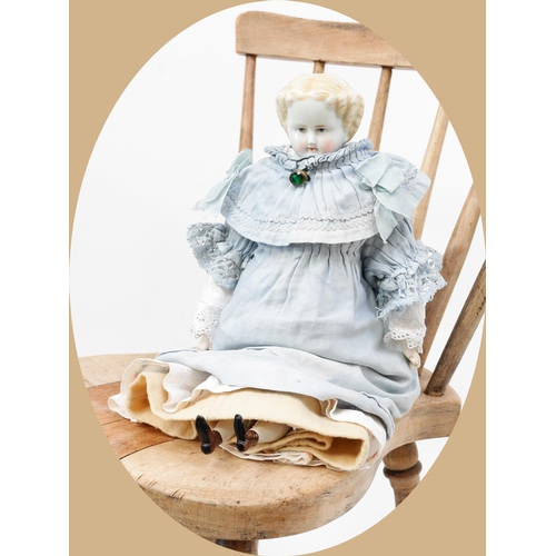 7138 - Toys From The Attic Part II - a 19th century glazed china shoulder head doll, the glazed head with m... 