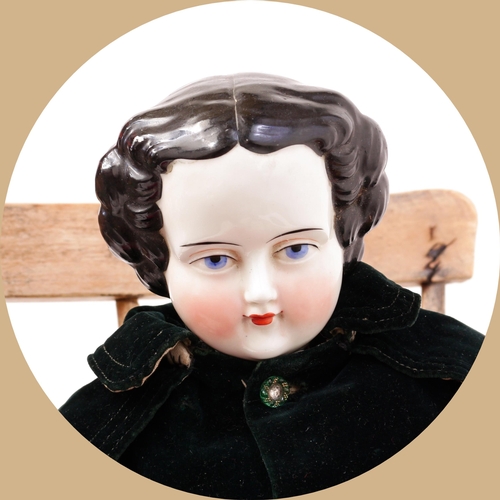 7139 - Toys From The Attic Part II - a 19th century glazed china shoulder head doll, the glazed head with m... 