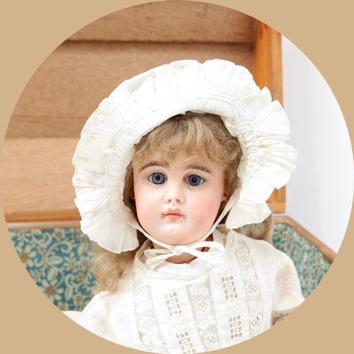 7153 - Toys From The Attic Part II - a German bisque head and painted composition bodied doll, the bisque h... 