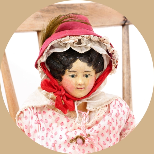 7142 - Toys From The Attic Part II - a 19th century painted papier-mâché shoulder head doll, the painted pa... 