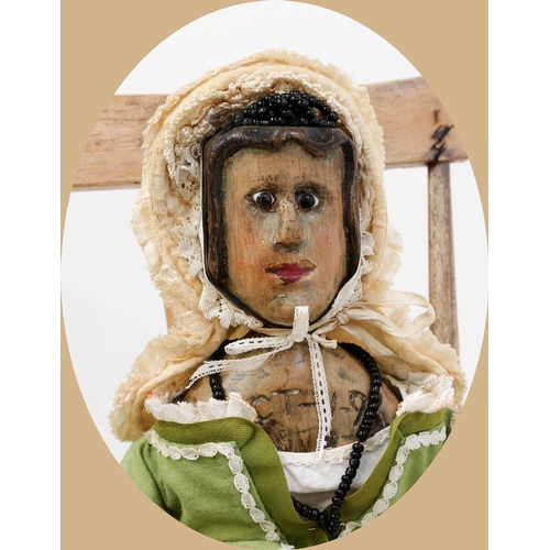 7184 - Toys From The Attic Part II - Folk Art - a carved and painted wooden doll as a Lady, the carved and ... 