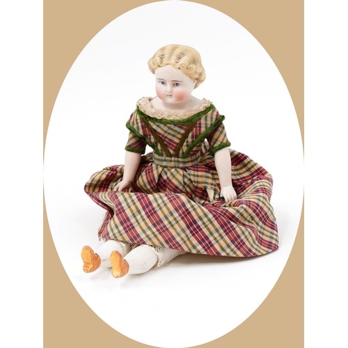 7145 - Toys From The Attic Part II - a 19th century unglazed Parian type shoulder head doll, the unglazed P... 