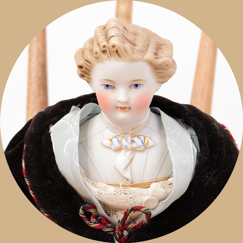 7143 - Toys From The Attic Part II - a 19th century Parian type shoulder head doll, attributed to Dornheim,... 