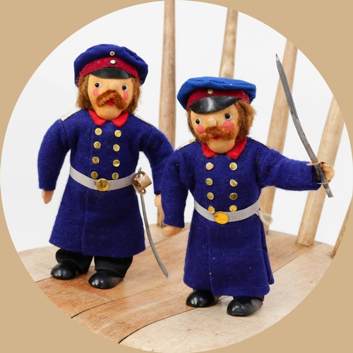 7162 - Toys From The Attic Part II - a mid-20th century novelty Berliner Police man figure, the stuffed sto... 