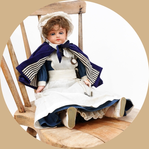 7175 - Toys From The Attic Part II - an early 20th century painted composition shoulder head doll, as a Mid... 