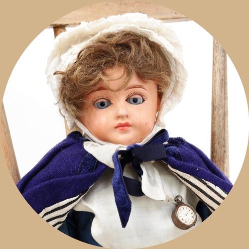 7175 - Toys From The Attic Part II - an early 20th century painted composition shoulder head doll, as a Mid... 