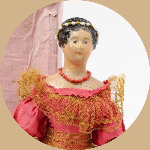 7161 - Toys From The Attic Part II - a mid 19th century painted papier-mâché shoulder head doll, the painte... 