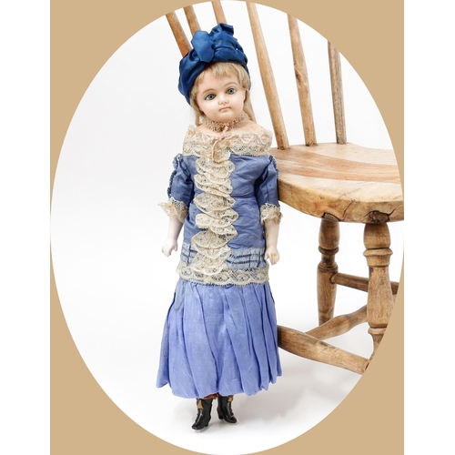 7147 - Toys From The Attic Part II - a 19th century wax over composition swivel head and shoulder doll, the... 