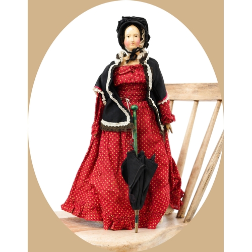 7190 - Toys From The Attic Part II - a 19th century painted papier-mâché shoulder head doll, the painted pa... 