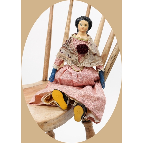 7196 - Toys From The Attic Part II - a painted papier-mâché shoulder head doll, the painted papier-mâché he... 