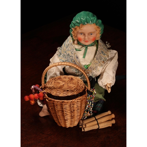 7201 - An English bisque shoulder head doll, modelled as a Gypsy, the bisque head with painted features inc... 