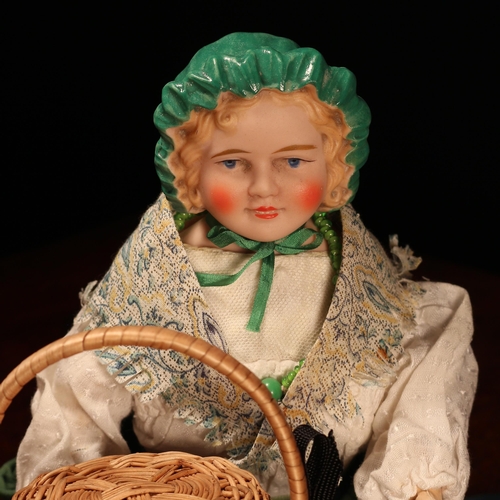 7201 - An English bisque shoulder head doll, modelled as a Gypsy, the bisque head with painted features inc... 