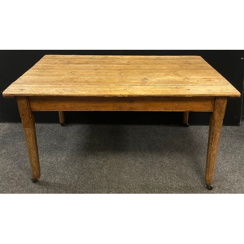 39 - An Irish scrub top pine table, 76.5cm high x 147cm x 98.5cm.