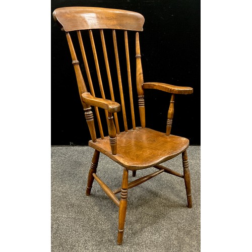 74 - A Victorian elm and stained beech spindle-back ‘Windsor’ chair, 109cm high x 54.5cm wide x 52cm deep... 