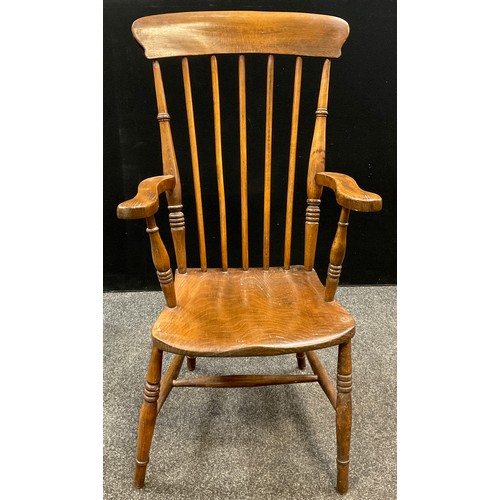 74 - A Victorian elm and stained beech spindle-back ‘Windsor’ chair, 109cm high x 54.5cm wide x 52cm deep... 