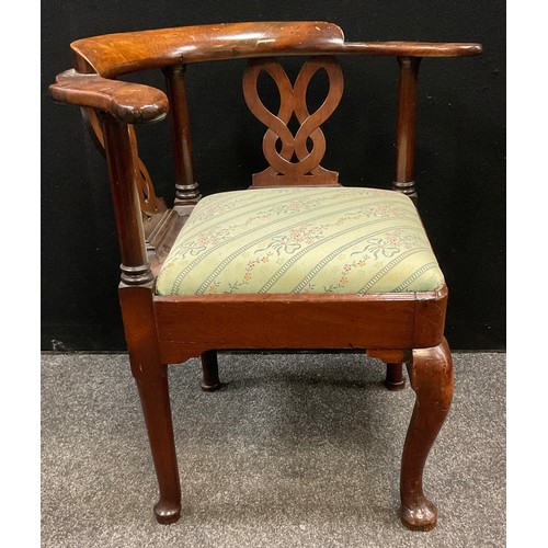 90 - A 19th century walnut corner open arm chair, carved ‘endless-knot’ splats, drop in seat, cabriole fo... 