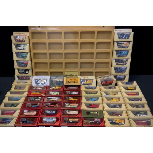 142 - Diecast Vehicles - Matchbox Models of Yesteryear Vans, Advertising vehicles, etc inc Harrods, Nestle... 