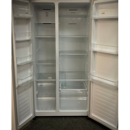 145 - A Logik American style fridge freezer, model no. BCD-518wy/HC4(EAH2). 180cm high x 90cm wide x 65cm ... 