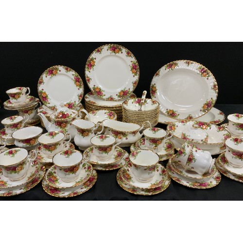 159 - A Royal Albert ‘Old Country roses’ table service for twelve including; a tea pot, milk jug, sugar bo... 