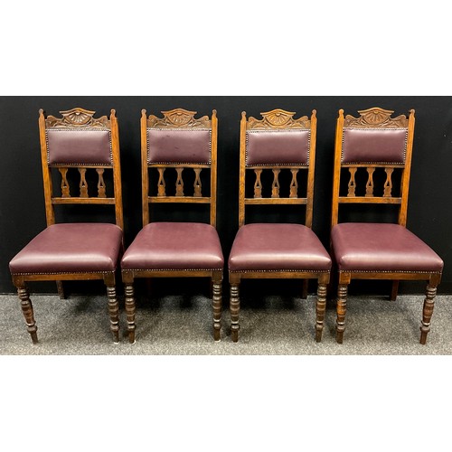 189 - A set of four oak Art Nouveau carved dining chairs, stuffed over seats, turned fore legs (4)