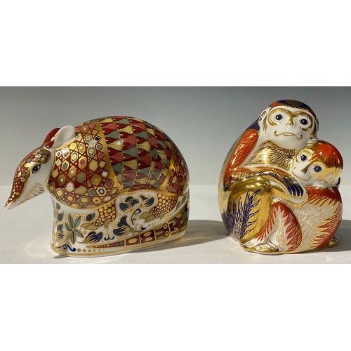 5115 - A Royal Crown Derby paperweight, Monkey and Baby, gold stopper, 9.5cm, printed mark in red, boxed; a... 