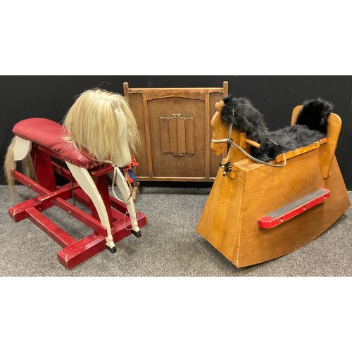 198 - A mid 20th century painted wooden rocking horse, 84cm high x 115cm x 50cm;  another rocking horse, w... 