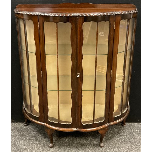 209 - A mahogany bow front china cabinet, 120cm high x 105cm wide x 38cm deep.