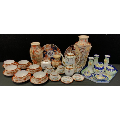 219 - Oriental ceramics - Imari plates, a set of six Kuntani egg shell tea cups and saucers, another tea s... 