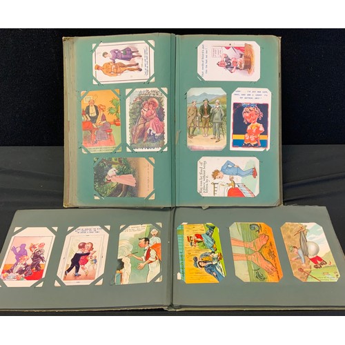 254 - Two Edwardian and later postcard albums mostly humorous and risqué cards inc Donald McGill, Reg Maur... 