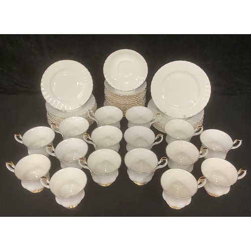 3061 - A Royal Albert Val D'Or pattern tea set, comprising fourteen cups and saucers, twelve tea plates, se... 