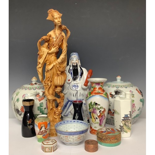 3065 - A Chinese export ware figure, two ginger jars and covers, assorted vases and trinket pots, resin dei... 