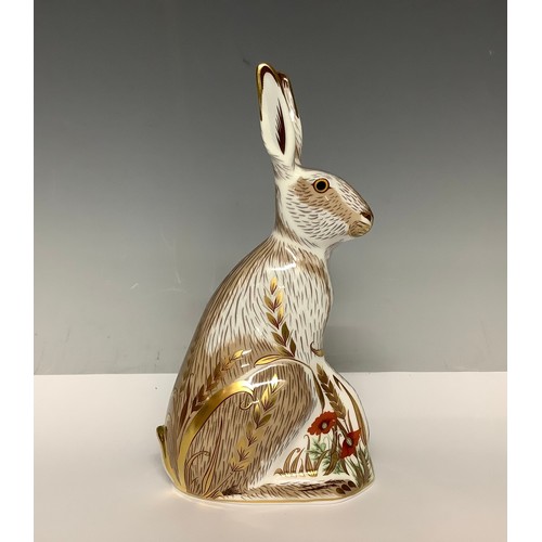 5111 - A Royal Crown Derby paperweight, Midsummer Hare, gold stopper, 17cm, printed mark in red