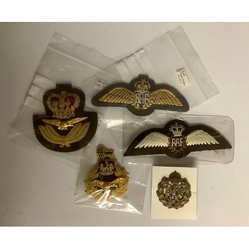 3151 - Badges - Military Interest - an RAF high rank cap badge; an RAF officer's cap badge; mess dress wing... 