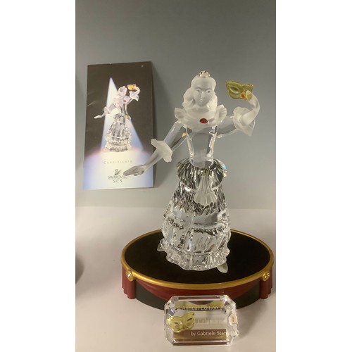 3180 - Swarovski - a set of three Masquerade trilogy figures, comprising Pierrot 1999, signed by the design... 