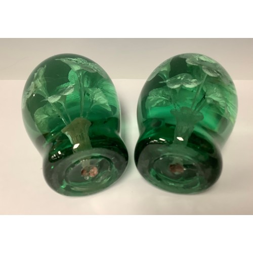 3182 - A pair of Victorian green glass dumps, each with Sulphur flower inclusions, 12cm, c, 1880