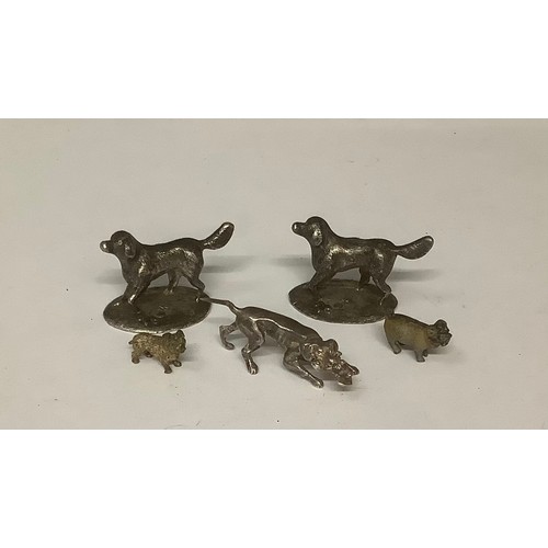 3206 - Two miniature Viennese cold painted dogs; a silvered dog with game; two silvered labradors (5)