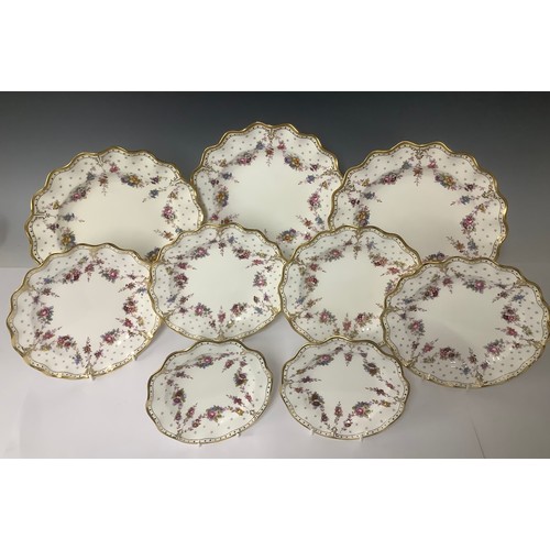 3215 - A set of three Royal Crown Derby shaped circular Royal Antoinette pattern dinner plates, second qual... 