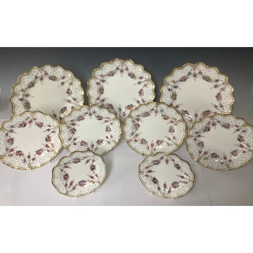 3215 - A set of three Royal Crown Derby shaped circular Royal Antoinette pattern dinner plates, second qual... 