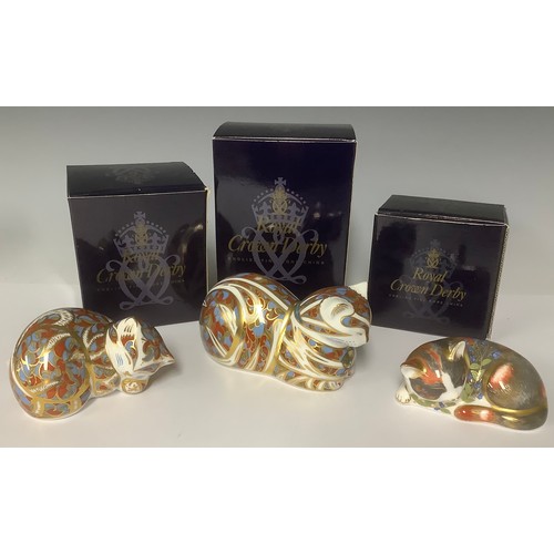 3221 - A pair of Royal Crown Derby paperweights, Contented cat and Contented Kitted, gold stoppers, printed... 