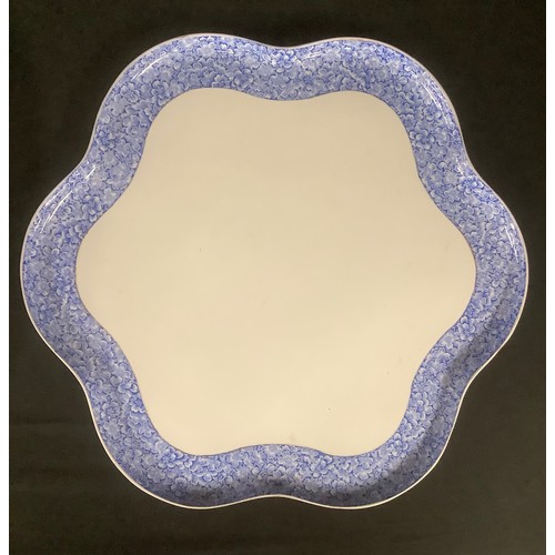 3276 - A large Royal Worcester shaped circular cabaret tray, the border printed with blue blossom, 50cm dia... 