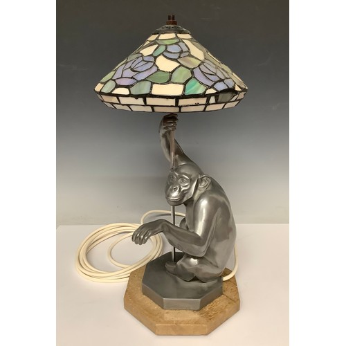 3283 - Boxes & Objects - Lights - a cast chimpanzee lamp, after Lawson Wood, with leaded Art Nouveau shade ... 