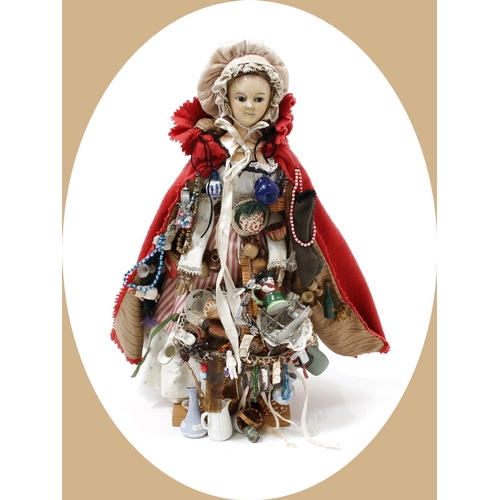 7200 - Toys From The Attic Part II - a 19th century painted papier-mâché shoulder head 'Pedlar' doll, the p... 