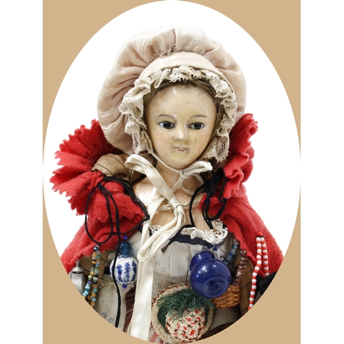 7200 - Toys From The Attic Part II - a 19th century painted papier-mâché shoulder head 'Pedlar' doll, the p... 