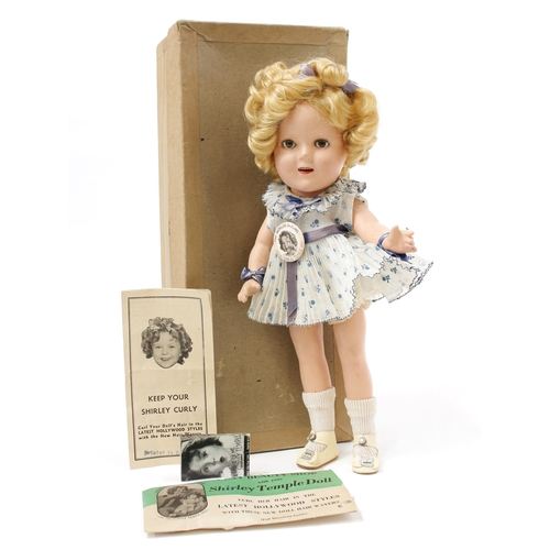 7214 - A 1930's Reliable Toy Company (Canada) Shirley Temple composition head and painted composition bodie... 