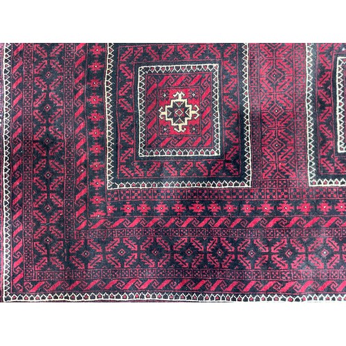 3296 - Middle East and the Orient - a Pakistan design Balouch type wool rug or carpet, 204cm x 109cm