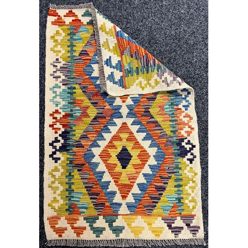 3301 - Rugs and Carpets - a Chobi kilim carpet, 101cm x 66cm