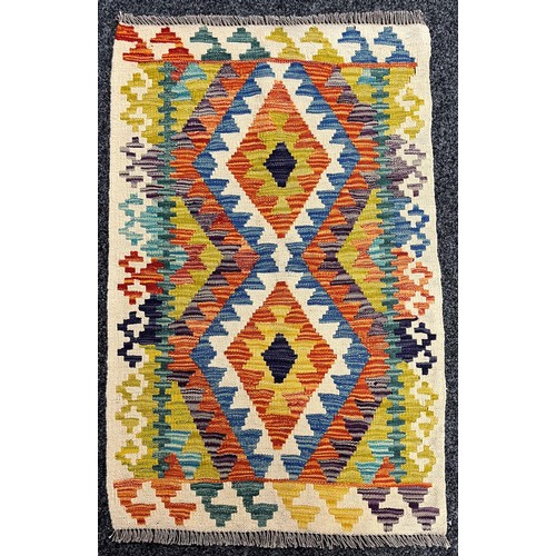 3301 - Rugs and Carpets - a Chobi kilim carpet, 101cm x 66cm