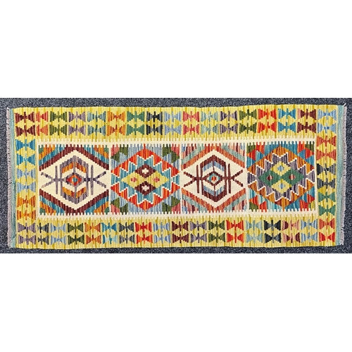 3303 - Rugs and Carpets - a Chobi kilim carpet runner, 153cm x 65cm